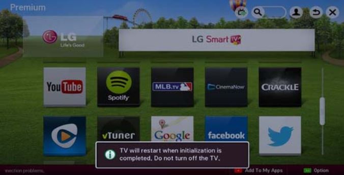 TV restart notification on screen.