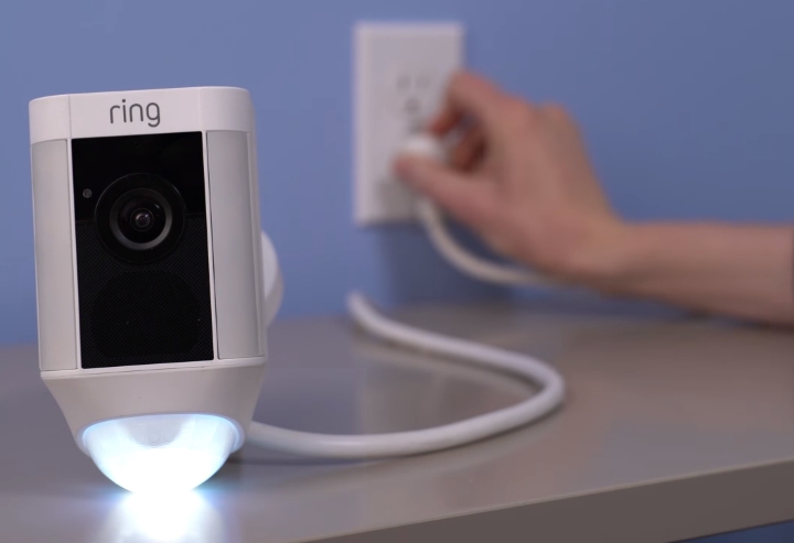 Camera connected to power outlet.