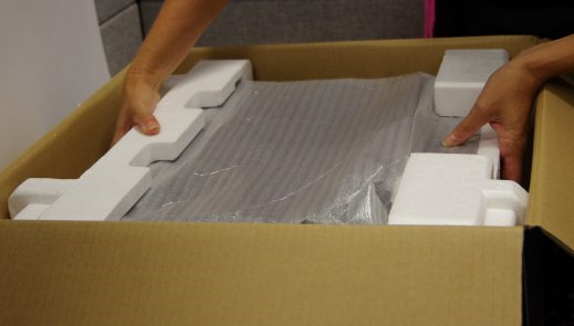 Unboxing a desktop computer.