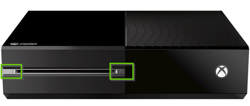 Front of an xbox one console with the bind and eject buttons highlighted.