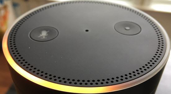 Amazon Echo with orange light.