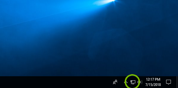 Windows 10 notification area with network icon highlighted. Screenshot