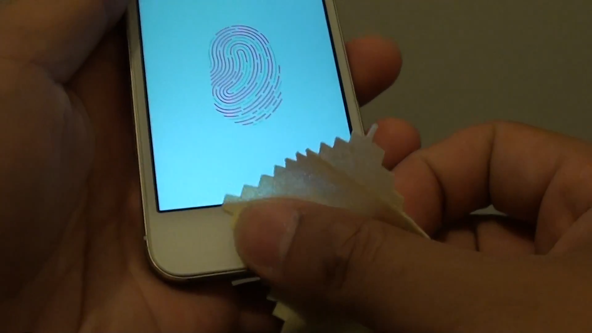 Cleaning iPhone screen.