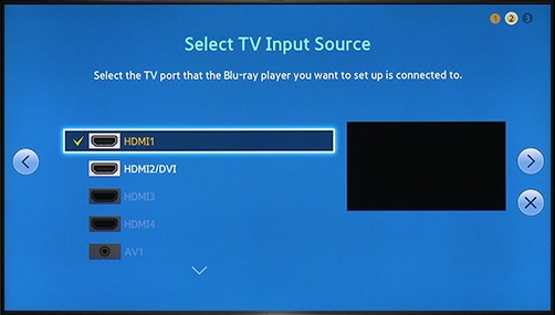 Selecting input source on TV.