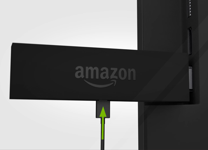 Power cord inserted securely into Fire TV Stick.