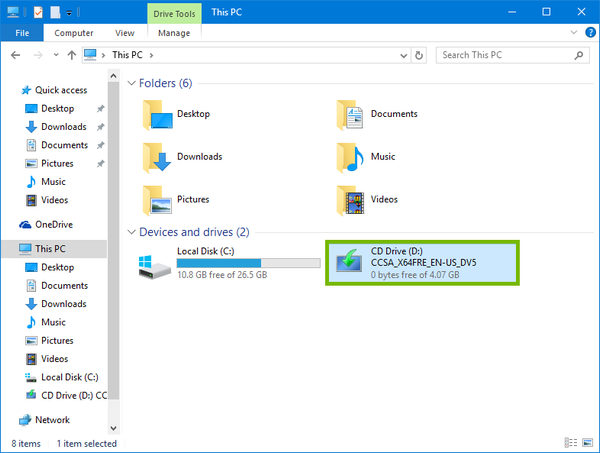 Windows File Explorer with disc drive highlighted.