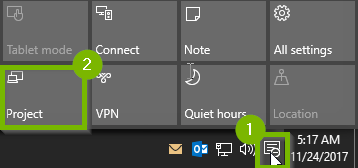 Windows 10 system tray highlighting the clicked notification icon and project icon within the notification center menu.