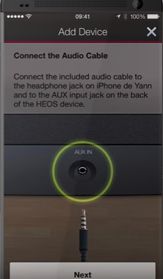 HEOS app displaying instructions for connecting your device via audio cable.