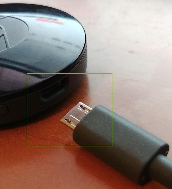 Chromecast USB power cable disconnected from Chromecast highlighted.