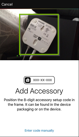 Philips Hue app with camera view up top and a Enter code manually button on the bottom.