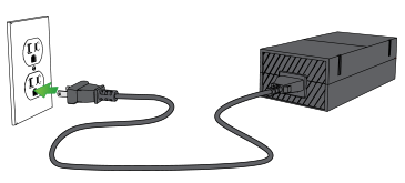 Xbox One power supply being plugged into wall outlet.