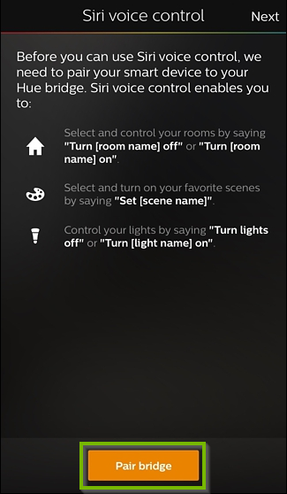 Philips Hue app with Pair Bridge button selected at the bottom.