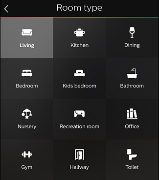 Philips Hue app with icons of various room types listed.