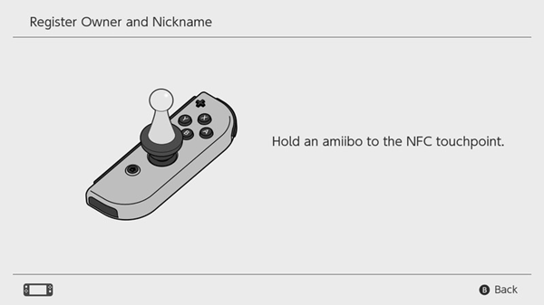 Amiibo registration explanation showing an amiibo held over the right joy con
