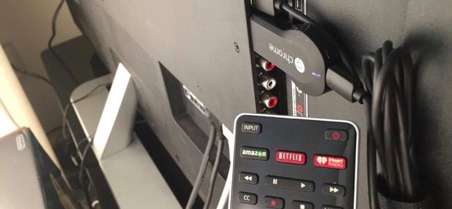 Chromecast connected to back of TV.