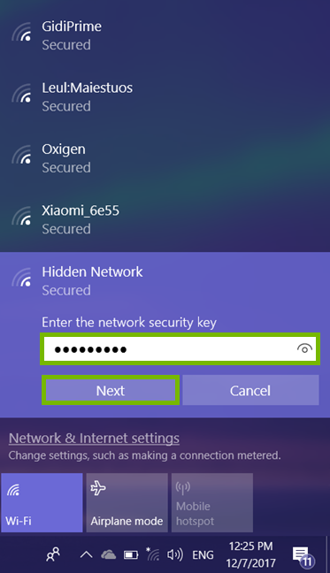 Wi-Fi password entry field and Next option highlighted in Wi-Fi network list.