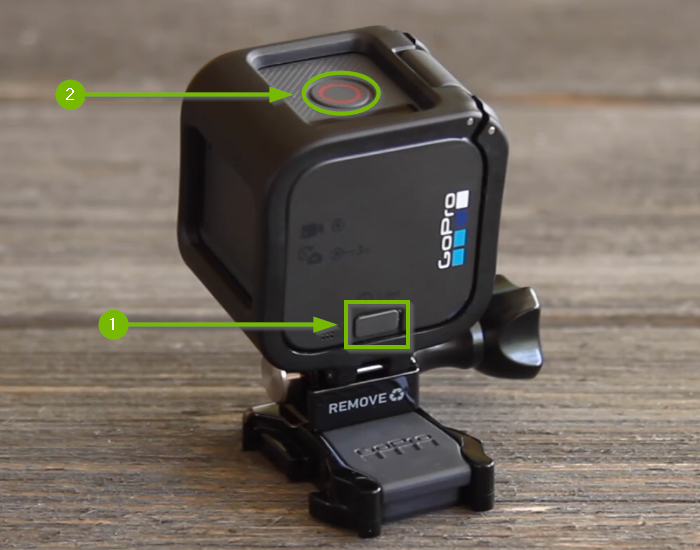 GoPro Session camera with Menu button highlighted on top and Shutter button highlighted on the side.