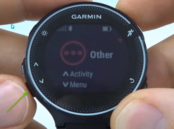 Garmin Forerunner with down arrow button selected.