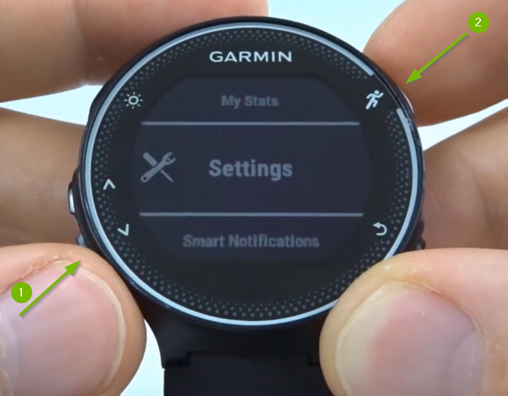 Garmin Forerunner with Settings selected on screen.