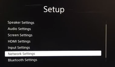 Setup menu highlighting the network settings option.