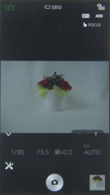 Phone screen showing remote view.