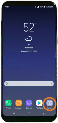 Smartphone with Camera app highlighted.