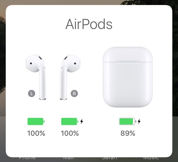 iOS screen with AirPods battery level display. Screenshot.