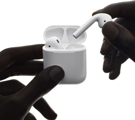 Removing Apple AirPods from their case.
