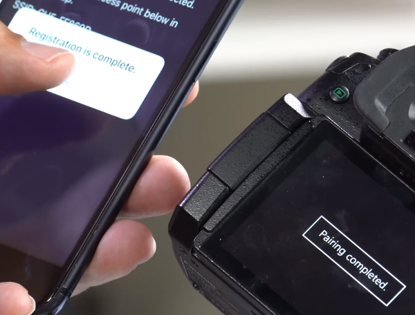 Pairing confirmation screens on phone and camera.