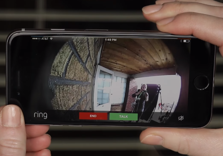 picture of phone showing doorbell camera outside