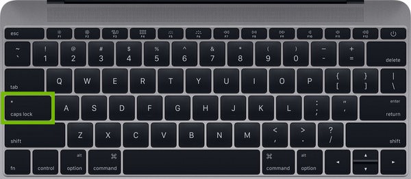 Mac Laptop Keyboard with caps lock key highlighted.