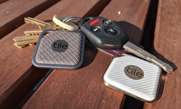 Tile affixed to a set of keys.