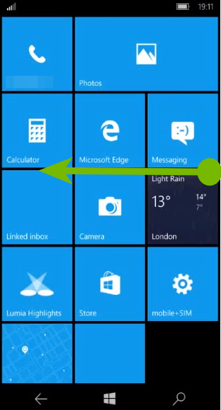 Windows Mobile home screen with arrow indicating to swipe from right to left