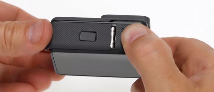 Closing battery compartment door