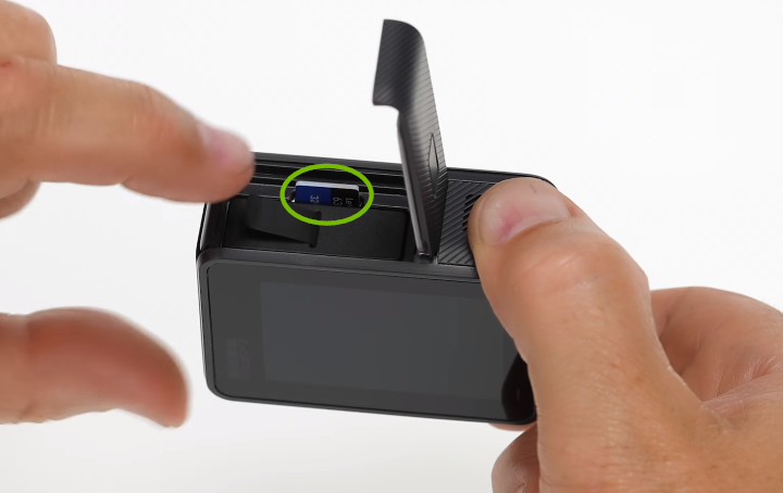 Inserting memory card into camera