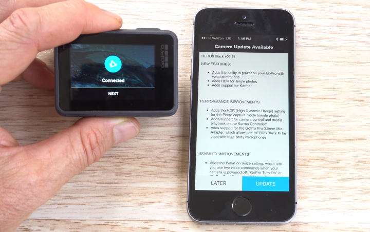 GoPro HERO6 displaying a successful connection screen, and a smartphone checking for available updates.
