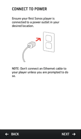 Speaker setup showing speaker being connected to power