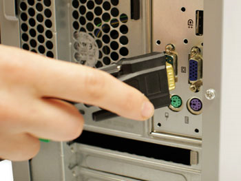 Monitor plugged into desktop.