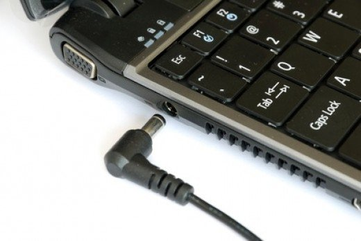 A laptop being plugged in