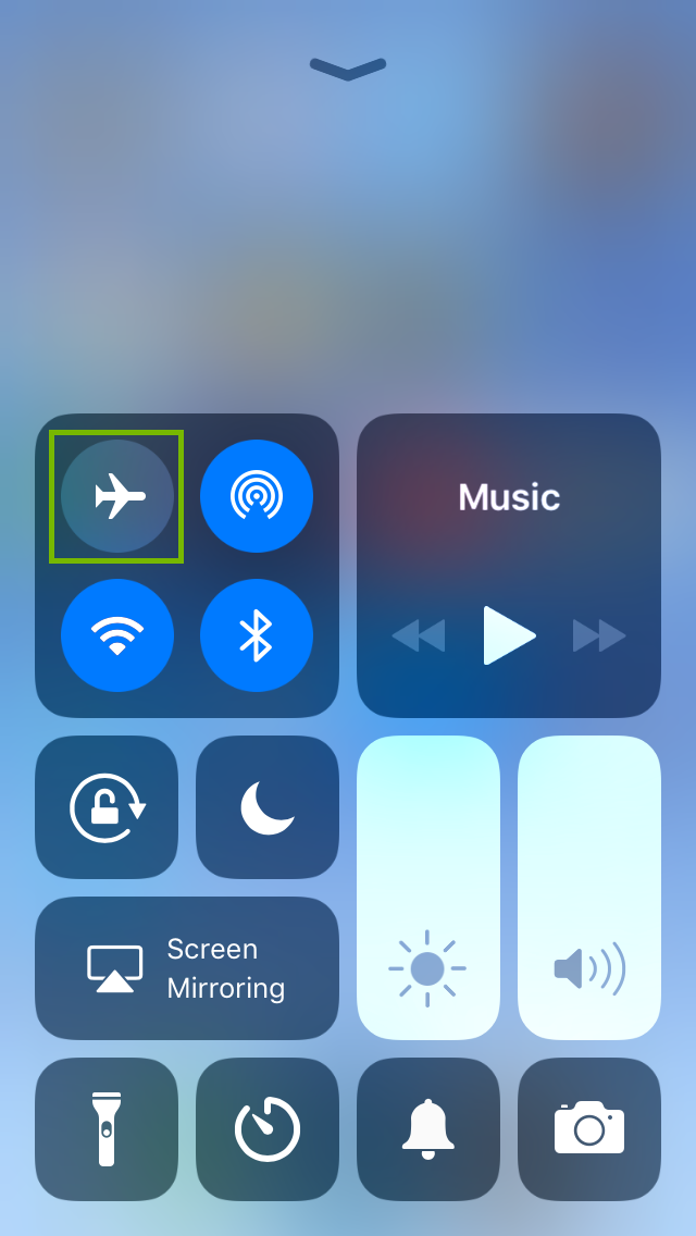 iPhone control center highlighting the airplane mode icon.
