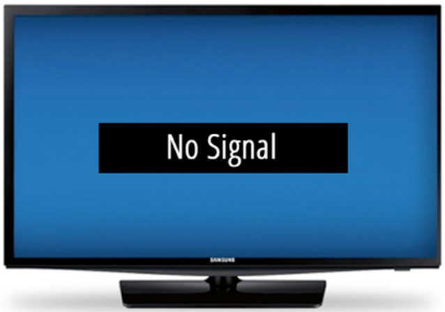 Television displaying a no signal message on-screen.