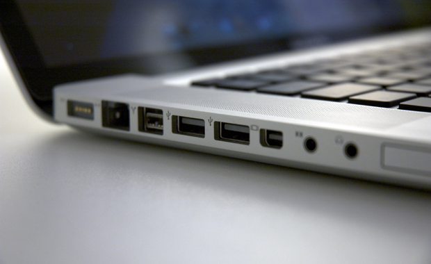 Photo of the USB ports on the side of a MacBook.