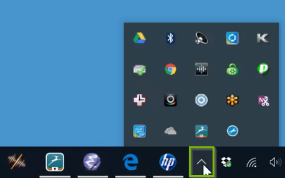 Windows 10 system tray highlighting the show hidden icons button.