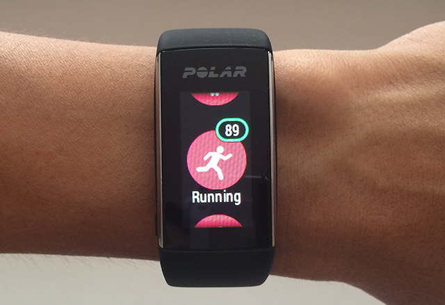 Polar watch displaying current heart rate on the watch face.