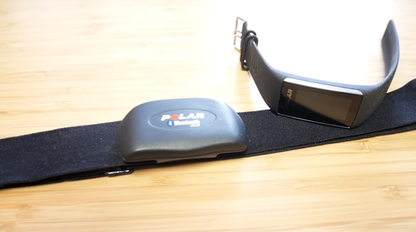Polar watch with heart rate sensor.