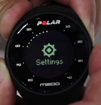 Polar M200 device displaying the settings option on-screen.