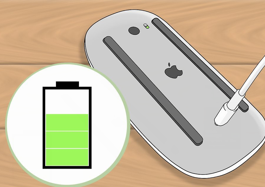 Apple Magic Mouse plugged in and charging.
