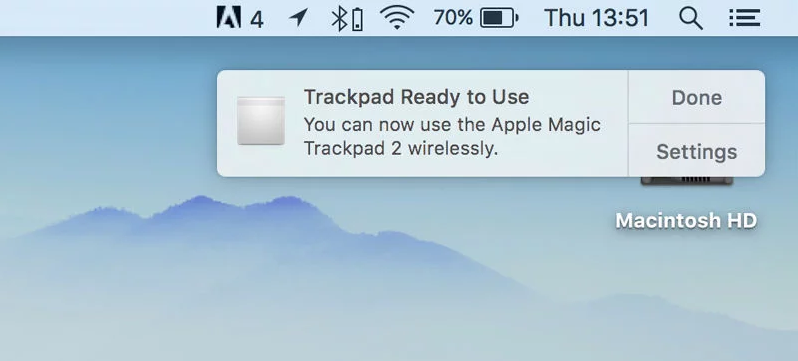 macOS and the Magic Trackpad Bluetooth pairing process.