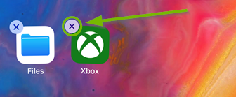 Xbox app with X in upper left corner highlighted. Screenshot.