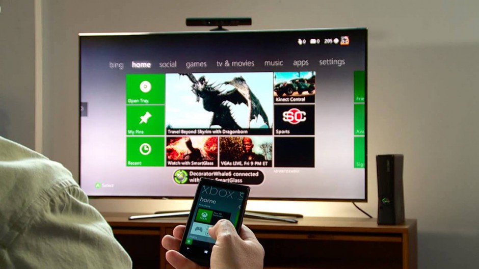 Smartphone controlling an Xbox 360 with the Smartglass app. Illustration.